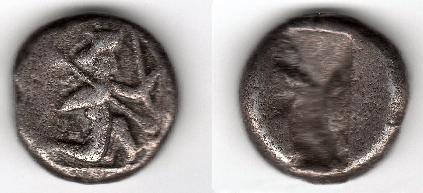 The Achaemenid empire in coins and inscriptions